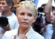 Ioulia Timochenko, photographiée ici le 24 juin 2011 à l'ouverture de son procès à Kiev. [Sergei Supinsky - AFP]