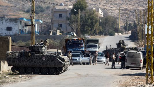 Un contrôle militaire à la frontière entre le Liban et la Syrie. [Stringer - AFP]