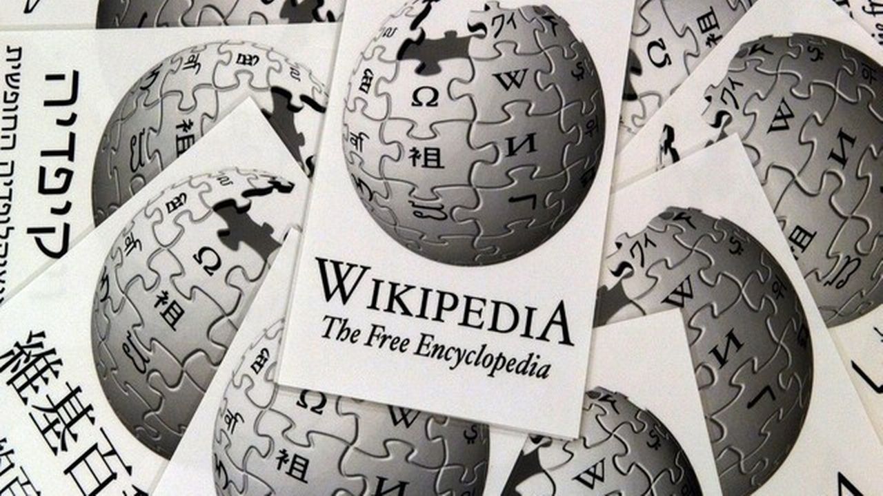 Le logo de Wikipédia. [BORIS ROESSLER / Keystone]