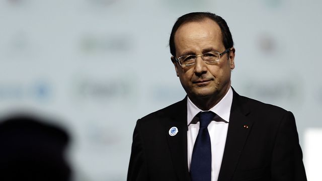 François Hollande a annoncé l'augmentation du contingent français depuis Abou Dhabi. [Karim Sahib - AFP]