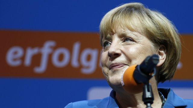 Angela Merkel a nettement remporté dimanche les élections législatives allemandes.  [Matthias Schrader - Keystone]