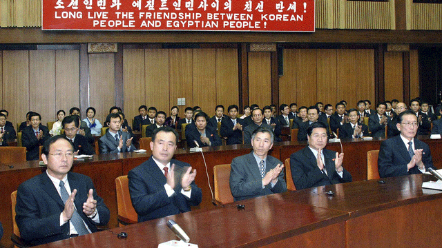 North Koreans take part in an inauguration ceremony of the third generation mobile communication service in Pyongyang December 15, 2008 in this picture released by North Korea's official news agency KCNA. The Egyptian mobile operater Orascom Telecom launched 3G mobile communiction service in North Korea on Monday. Picture taken December 15, 2008. REUTERS/KCNA (NORTH KOREA). QUALITY FROM SOURCE. NO THIRD PARTY SALES. NOT FOR USE BY REUTERS THIRD PARTY DISTRIBUTORS. [KCNA (Corée du Nord)]