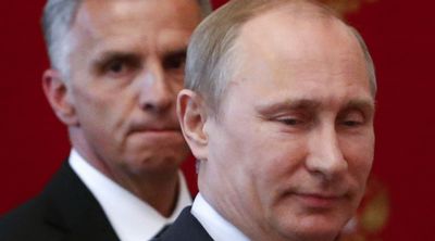 Le président russe Vladimir Poutine et le président de la Confédération Didier Burkhalter. [Sergei Karpukhin - AP Photo]