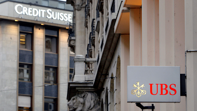 Dans la gestion de fortune, UBS s'en sort mieux que Credit Suisse. [Fabrice Coffrini - AFP]
