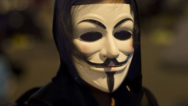 Un individu se réclamant du groupe Anonymous menace le système informatique de la Ville de Lausanne. [Miguel Candela - NurPhoto/AFP]