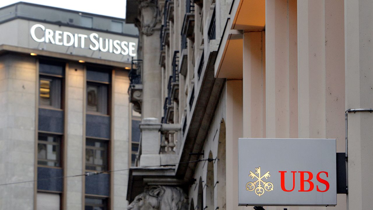 Credit Suisse et UBS sont sous pression en Allemagne et en France. [Fabrice Coffirni - AFP]