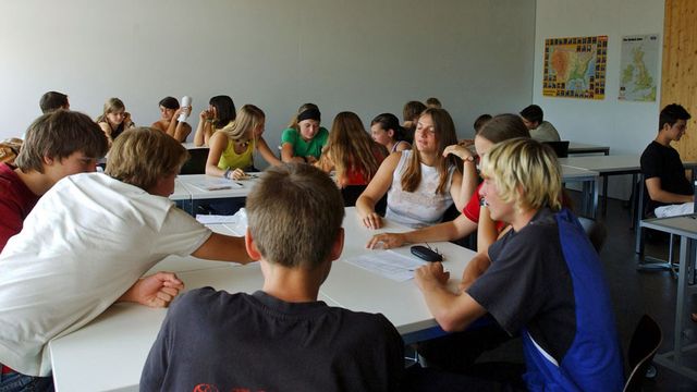 Cours de français dans une classe de Wil, en Thurgovie. [Regina Kühne - Keystone]