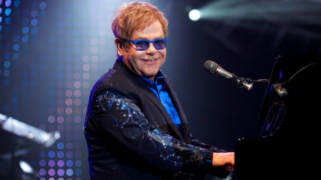 Elton John lors d'un concert à la Wembley Arena à Londres. [TAL COHEN - KEYSTONE]