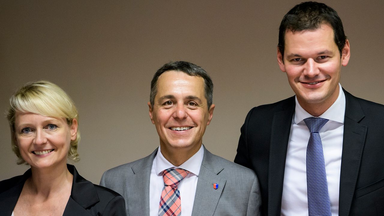 Les trois candidats PLR à la succession de Didier Burkhalter. [Jean-Christophe Bott - Keystone]