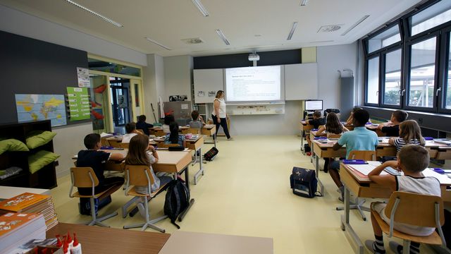 Une classe dans une école du Grand-Saconnex, à Genève. [Salvatore Di Nolfi - Keystone]