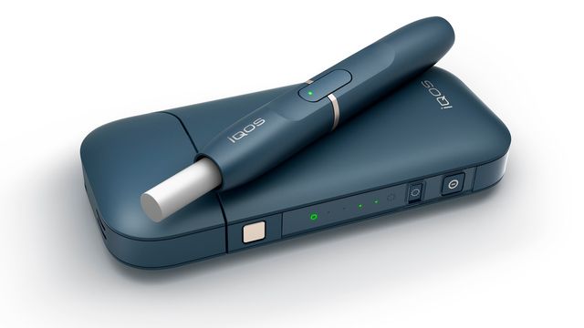 La cigarette Iqos, avec un dispositif électronique qui chauffe du tabac. [Philip Morris via AP - keystone]
