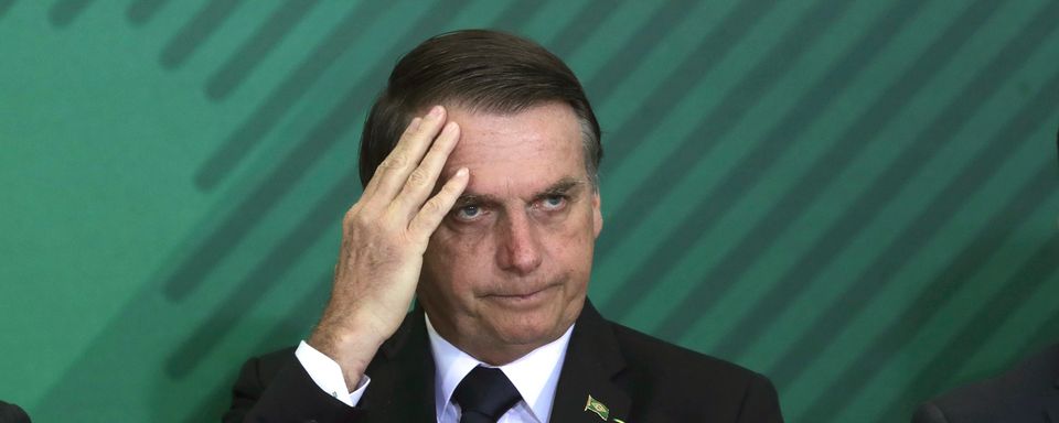 Le fils aîné de Jair Bolsonaro impliqué dans une affaire de corruption. [Eraldo Peres - AP/Keystone]