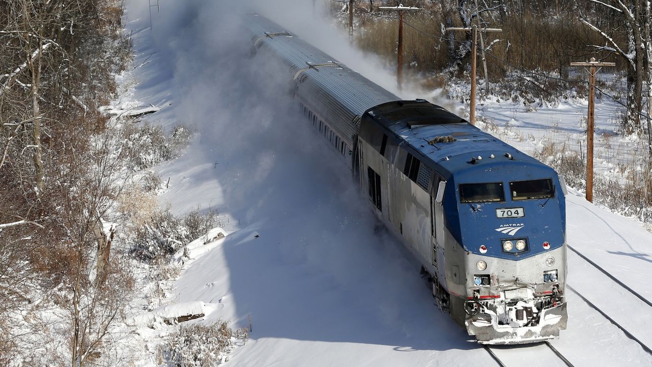 Un train Amtrak dans la neige (image d'illustration). [AP/Mike Groll - Keystone]