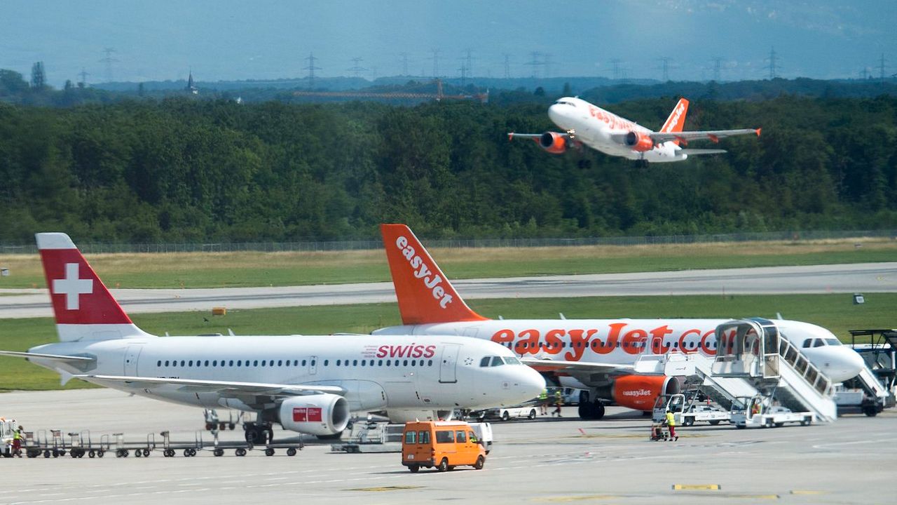 L'Etat de Genève veut limiter les voyages en avion. [Jean-Christophe Bott - Keystone]