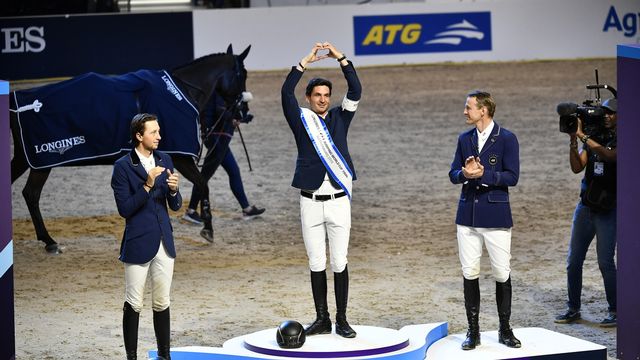 Fuchs (à gauche) et Guerdat (au centre) sur le podium. [Bjorn Larsson Rosvall - Keystone]