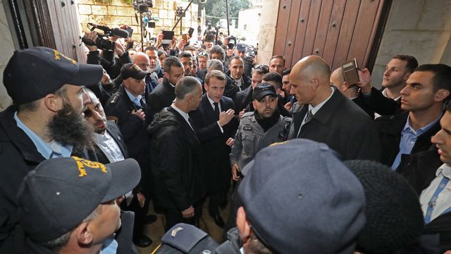 Emmanuel Macron a eu une altercation avec des policiers israéliens à l'entrée de l'église Sainte-Anne à Jérusalem. [Ludovic Marin - AFP]