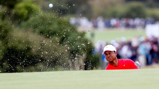 Tiger Woods, ici en compétition, appelle au calme. [TIM CARRAFA - AP]