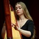 La harpiste Tjasha Gafner enregistre seule à la Salle Ansermet le jeudi 14 mai 2020 dans le cadre du projet Tribune Libre. [Jay Louvion - RTS]