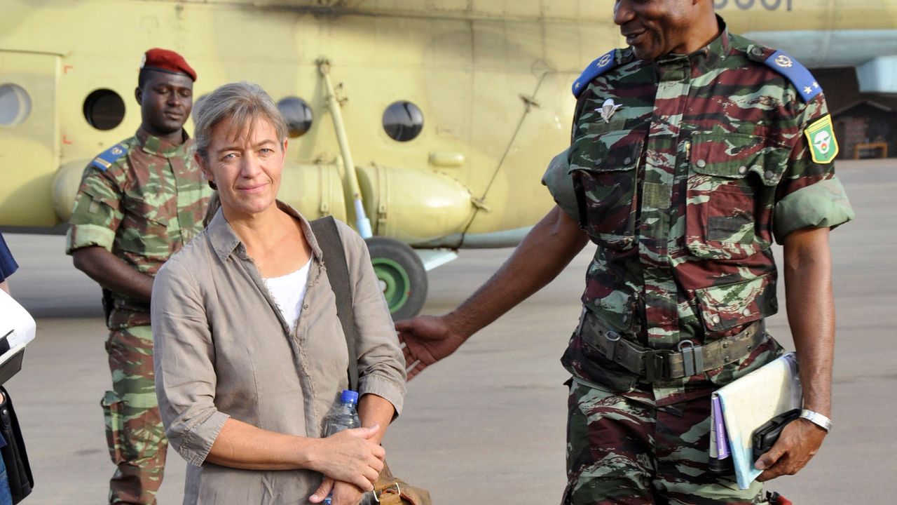 FILE - In this April 24, 2012, file photo, released Swiss hostage Beatrice Stoeckli, left, stands in Ouagadougou, Burkina Faso, following arrival by helicopter from Timbuktu, Mali, after being handed over by militant Islamic group Ansar Dine. SwitzerlandâÄ&#x2122;s Foreign Ministry said Friday, Oct. 8, 2020, that Stoeckli has been killed by an Islamist group. The ministry said it was informed by French authorities that the hostage had been âÄ&#x153;killed by kidnappers of the Islamist terrorist organization JamaâÄ&#x2122;at Nusrat al-Islam Muslimeen about a month ago.âÄ Stoeckli was kidnapped four years ago. (AP Photo/Brahima Ouedraogo, File)
 [Brahima Ouedraogo - AP via Keystone]