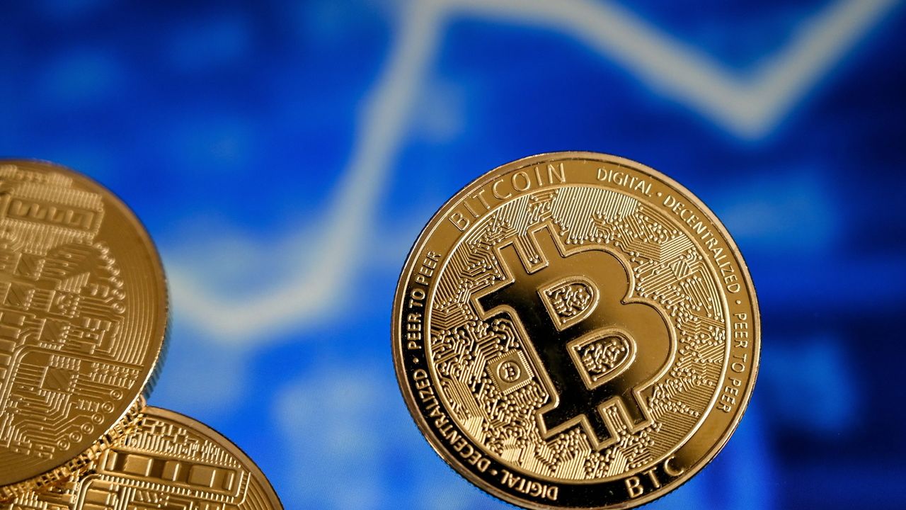 Le bitcoin a passé pour la première fois la barre des 60'000$ en mars [Keystone]