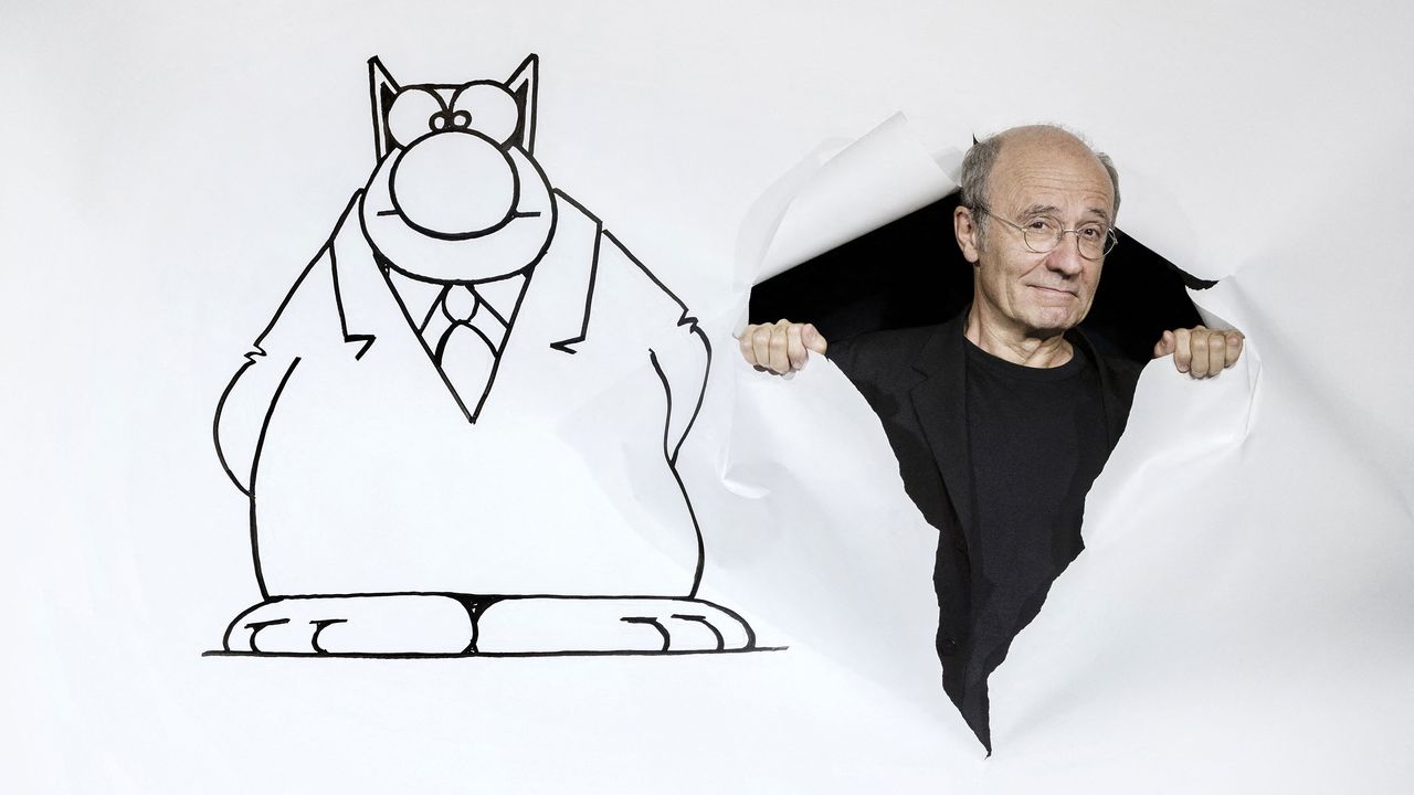 Le dessinateur belge Philippe Geluck et son fameux Chat. [Joël Saget - AFP]