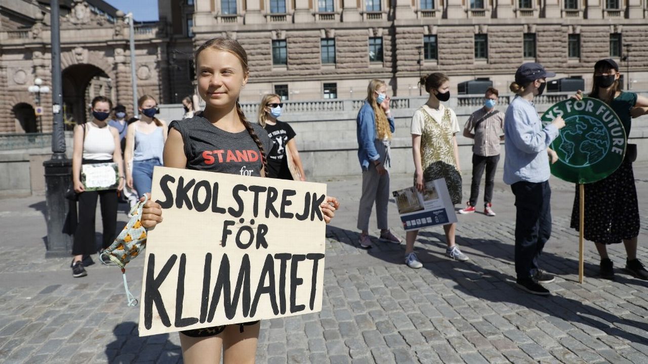 La militante suédoise pour le climat Greta Thunberg voit une corrélation entre vague de chaleur touchant son pays et changements climatiques. [Christine Olsson - afp]