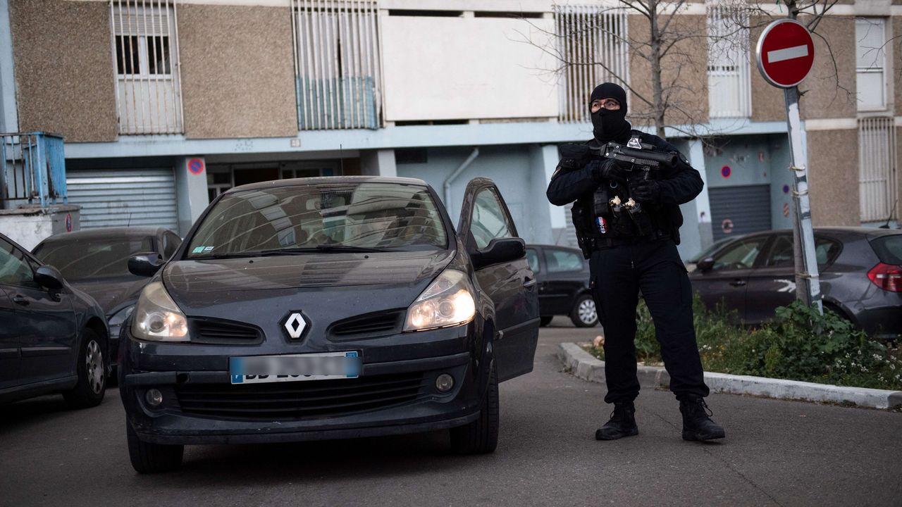 Opération anti-drogue dans la "Cité des oliviers", dans les quartiers nord de Marseille, le 26 mars 2020.  [Clément Mahoudeau - AFP]