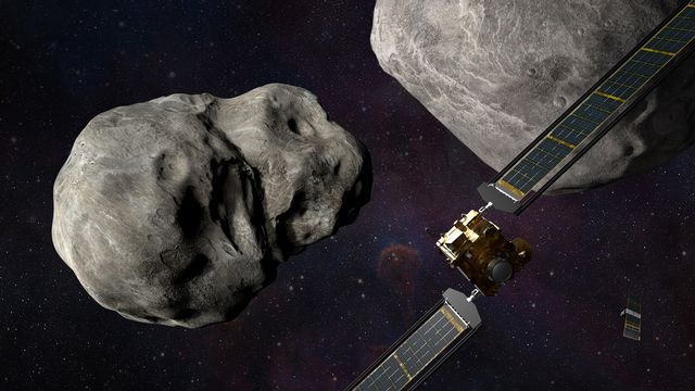 Une illustration de la NASA montrant le vaisseau DART s'approchant des astéroïdes Dimorphos et Didymos. [Steve Gribben/NASA/Johns Hopkins APL - Keystone/epa]