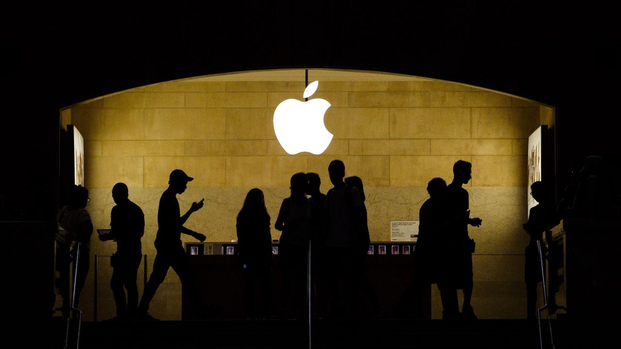 Apple a franchi le seuil symbolique des 3000 milliards de dollars de capitalisation. [Justin Lane - Keystone/EPA]