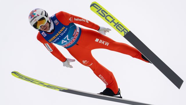Simon Ammann va marquer encore un peu plus l'histoire du sport olympique suisse à Pékin. [Georg Hochmuth - Keystone]