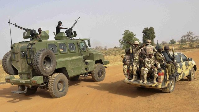L'armée nigériane patrouille à Chibok au nord-est du Nigeria, le 5 mars 2015 (image prétexte). [Henry Ikechukwu - Keystone/EPA]