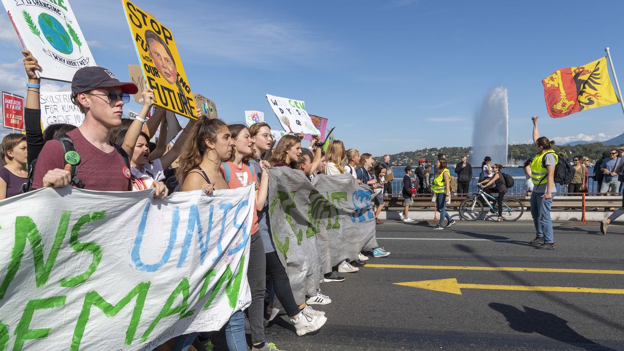 Une manifestation pour le climat en septembre 2019 à Genève. [Martial Trezzini - Keystone]