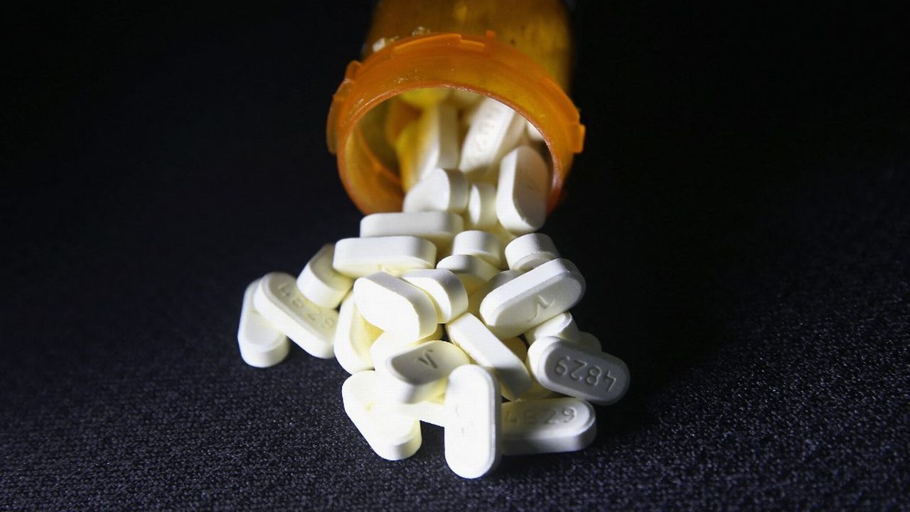 Une boîte de pilule contre la douleur chronique. [John Moore/Getty Images - AFP]