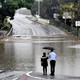Au moins six personnes ont péri dans des inondations provoquées par des pluies diluviennes sans précédent depuis des décennies dans l'est de l'Australie. [Saeed Khan - afp]