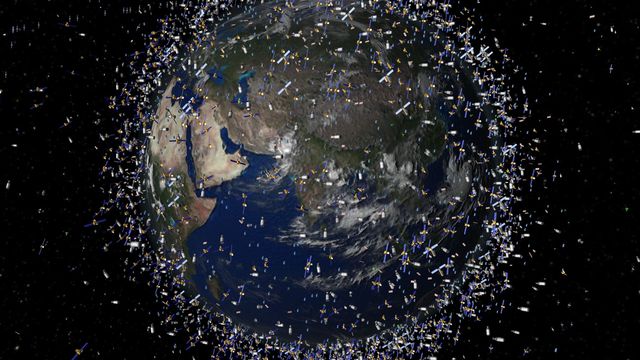 Une vue d'artiste sur la Terre et ses satellites. [ESA - AP Photo/Keystone]