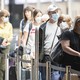 Une centaine de passagers en transit vers Shangai, en Chine, sont bloqués depuis dimanche soir à l'aéroport de Zurich (image d'illustration) [Ennio Leanza - Keystone]