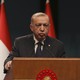 Le président turc Recep Tayyip Erdogan en conférence de presse à Ankara le 22 mars 2022. [Burhan Ozbilici - AP/Keystone]