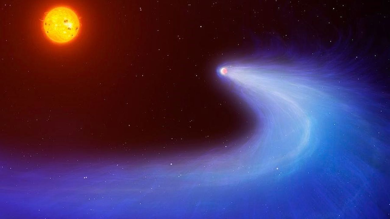 Un gigantesque nuage d'hydrogène, semblable à une comète, s'échappe de l'exoplanète de type Neptune-chaude, GJ 436b. [Mark Garlick (vue d'artiste) - Université de Warwick]