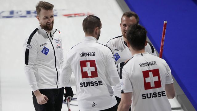 L'équipe de Suisse a retrouvé le sourire aux Championnats du monde. [John Locher - Keystone]
