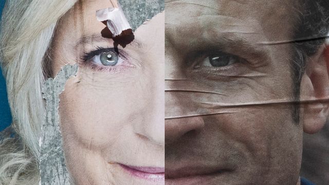 Affiches de campagne de Marine Le Pen et d'Emmanuel Macron. [Thibaut Durand - Hans Lucas/AFP]
