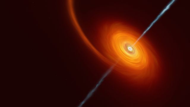 Vue d'artiste illustrant ce qui se passe lorsqu'une étoile s'approche trop près d'un trou noir, où l'étoile est comprimée par l'intense attraction gravitationnelle du trou noir. Une partie de la matière de l'étoile est aspirée et tourbillonne autour du trou noir, formant le disque que l'on peut voir sur cette image. Dans de rares cas, comme celui-ci, des jets de matière et de rayonnements sont projetés depuis les pôles du trou noir. [M.Kornmesser - ESO]