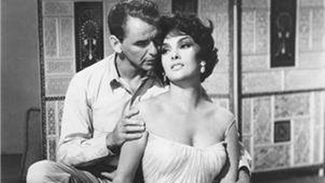 Frank Sinatra et Gina Lollobrigida dans le film "Never So Few" en 1959. [Keystone]