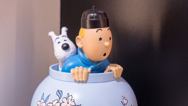 Tintin et Milou, l'homme et l'animal inséparables. [Wang gang / Imaginechina - AFP]