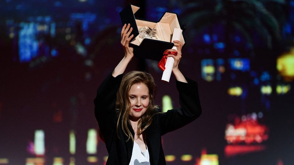 La Palme d'or du 76e Festival de Cannes est attribuée à "Anatomie d'une chute" de Justine Triet. [Christophe Simon - AFP]