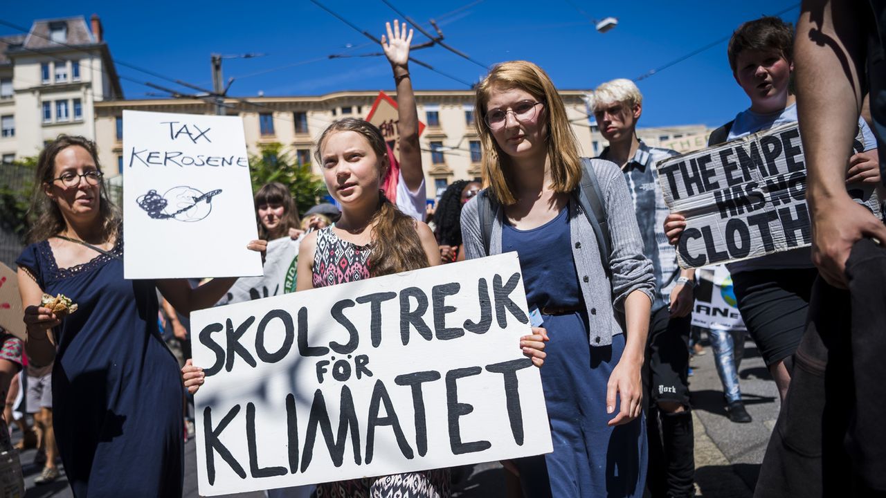 Greta Thunberg, fraîchement diplômée, cesse sa grève scolaire pour le climat. [Jean-Christophe Bott - Keystone]