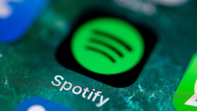 Spotify écope d'une amende de près de 5 millions d'euros. [Fabian Sommer - Keystone]