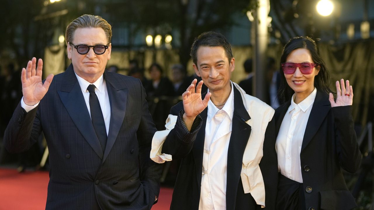 Benoit Magimel, Tran Anh Hung et Tran Nu Yen Khe au festival international du film de Tokyo en octobre 2023. [Shuji Kajiyama - Keystone]