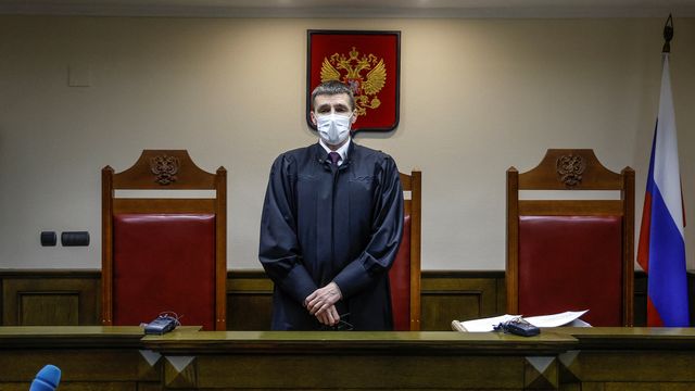 Oleg Nefedov, a judge of Russia’s Supreme Court, reads out the verdict during a hearing to consider a request by the Ministry of Justice to recognize the LGBTQ movement as extremist in Moscow, Russia, November 30, 2023. REUTERS/Maxim Shemetov [Maxim Shemetov - reuters]